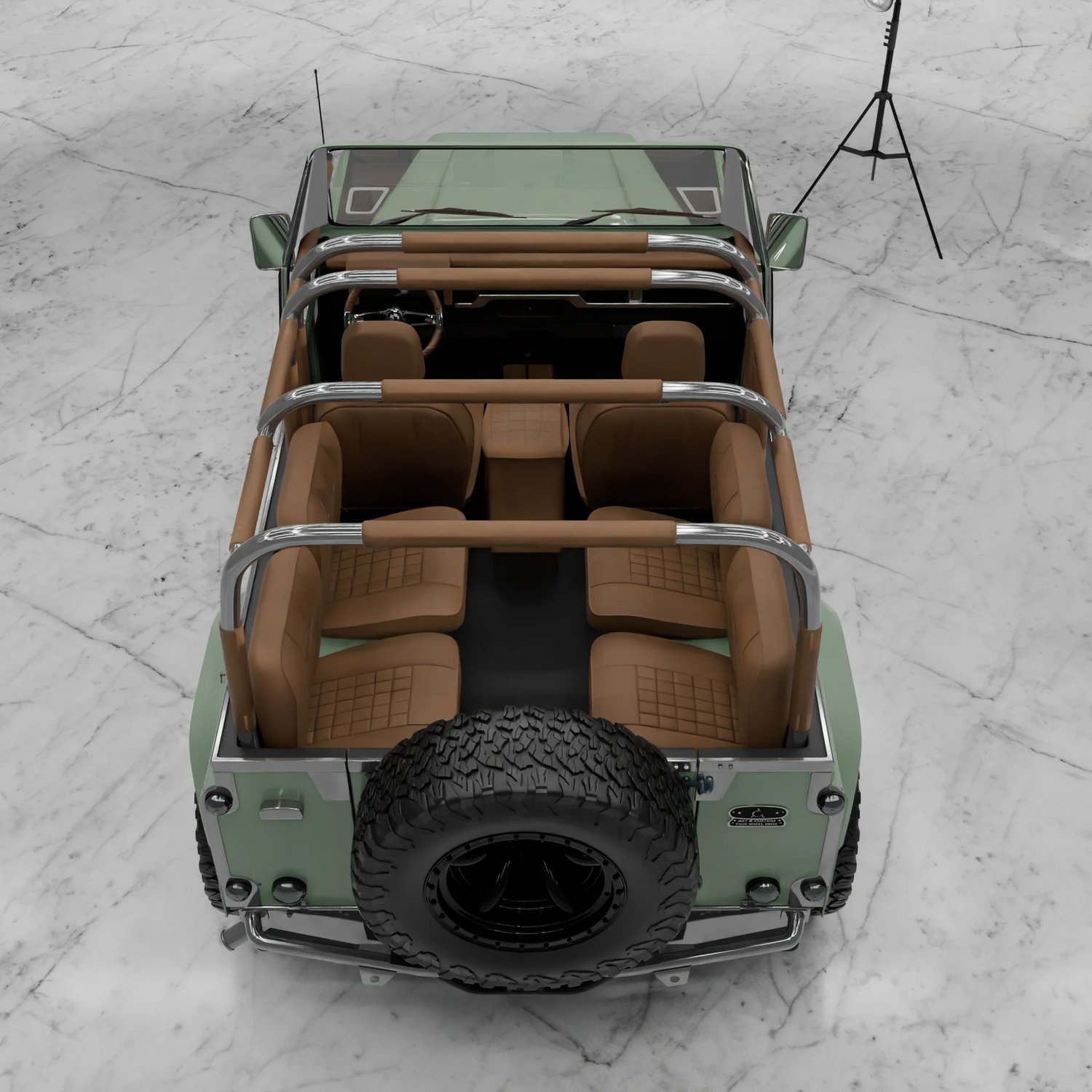 Intérieur Classic Defender — sellerie cuir cognac surpiqué, 4 places et arceau