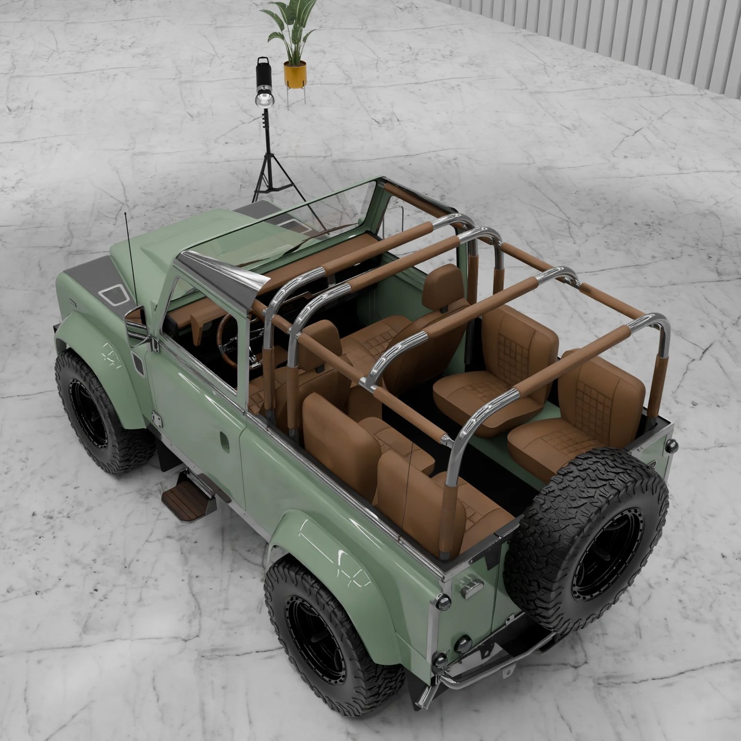 Intérieur Classic Defender — habitacle cuir cognac, vue 3/4 plongeante